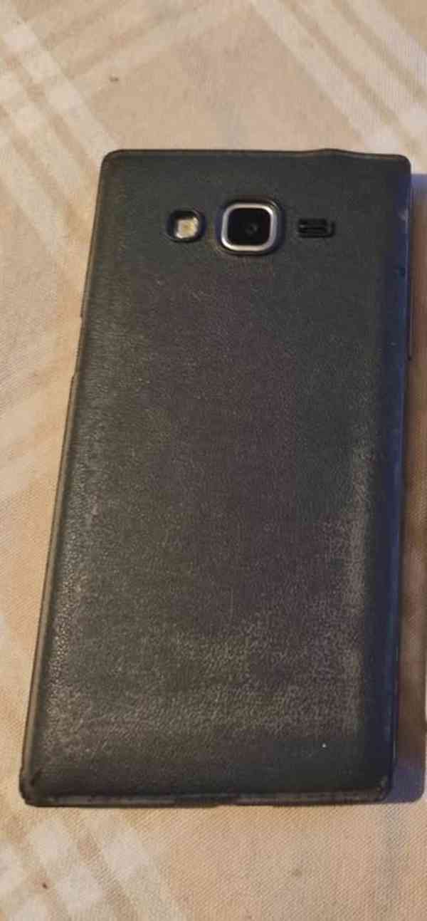 Mobilní dotykový telefon Samsung - foto 3