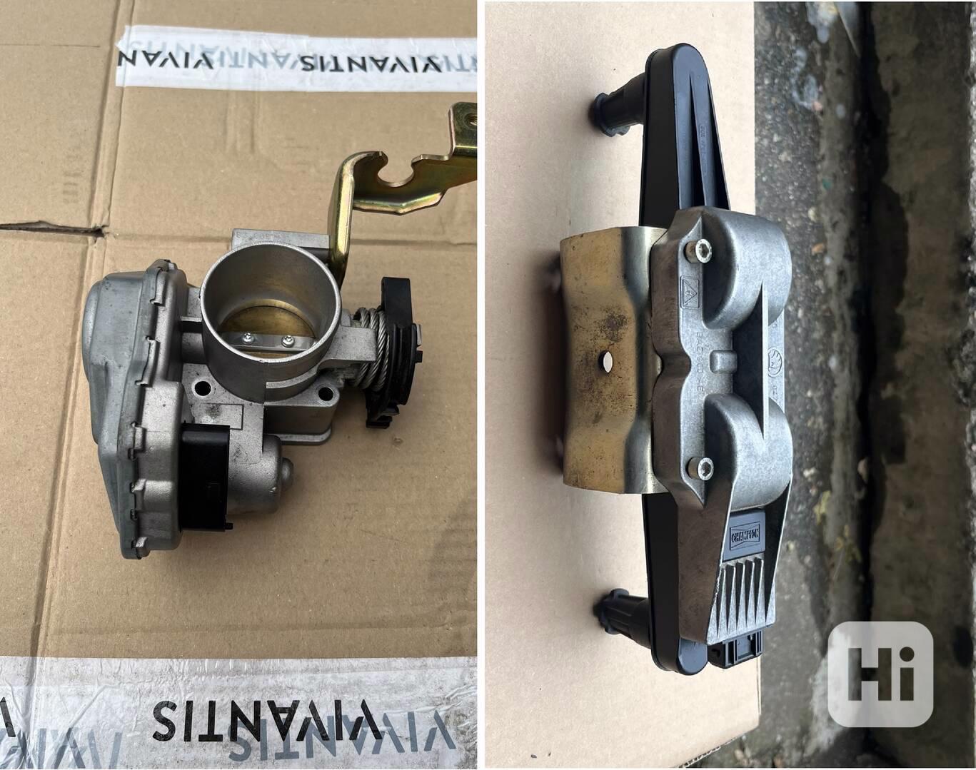 Škrtící klapka a zapalovací lišta na FELICIA málo použité - foto 1