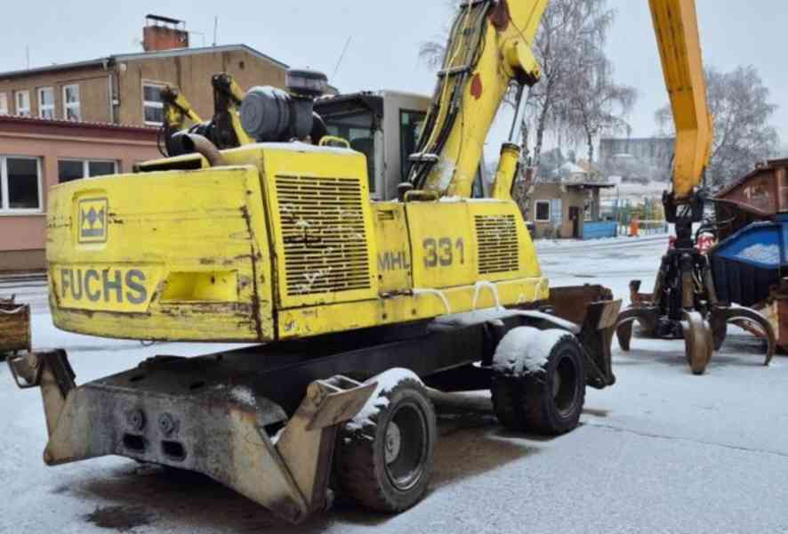 22.5t překládací bagr Fuchs 331 kovošrot kolové rypadlo - foto 4