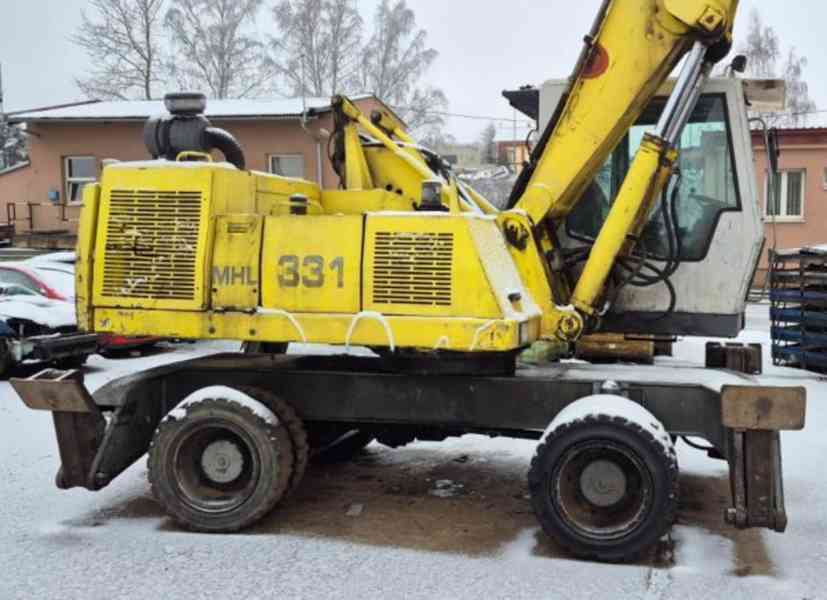 22.5t překládací bagr Fuchs 331 kovošrot kolové rypadlo - foto 3