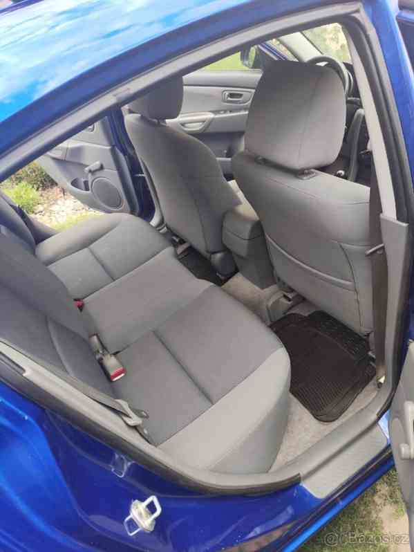 Mazda 3 1,6   77Kw r..v. 2008 najeto 141k - foto 16