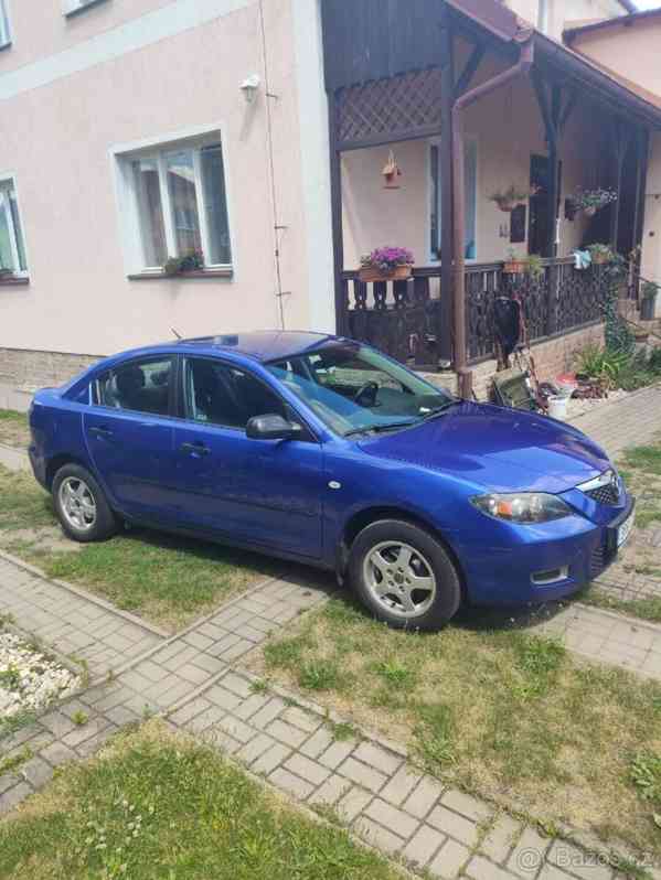 Mazda 3 1,6   77Kw r..v. 2008 najeto 141k - foto 4