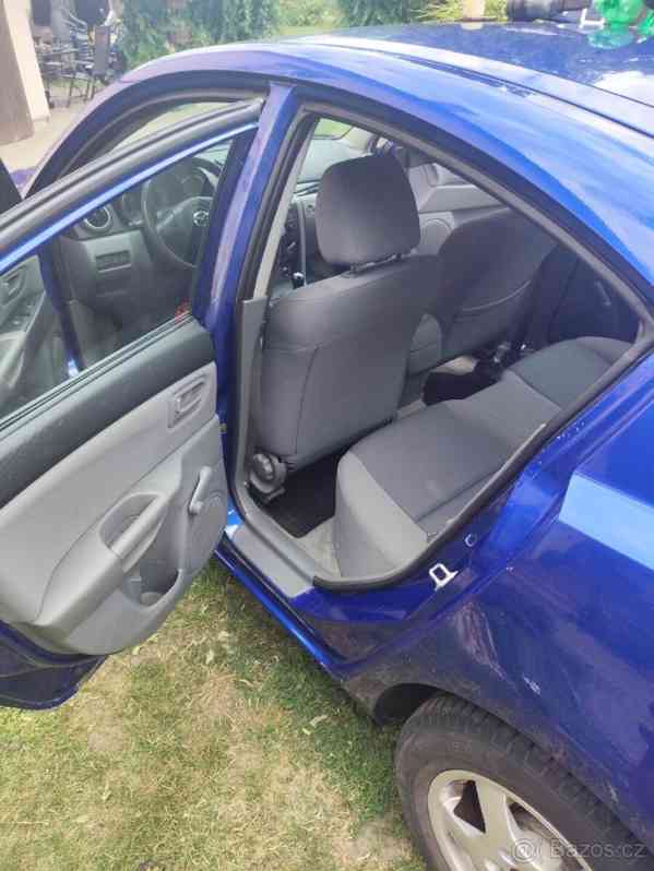 Mazda 3 1,6   77Kw r..v. 2008 najeto 141k - foto 14