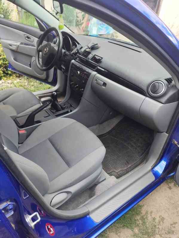 Mazda 3 1,6   77Kw r..v. 2008 najeto 141k - foto 13