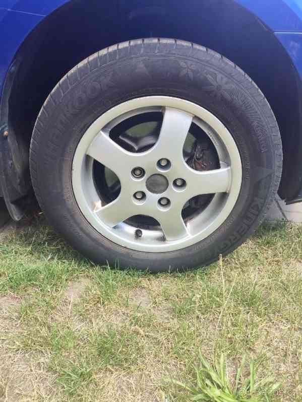 Mazda 3 1,6   77Kw r..v. 2008 najeto 141k - foto 8
