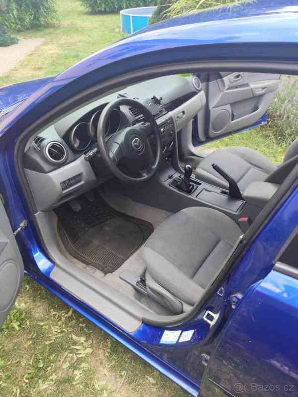 Mazda 3 1,6   77Kw r..v. 2008 najeto 141k - foto 17