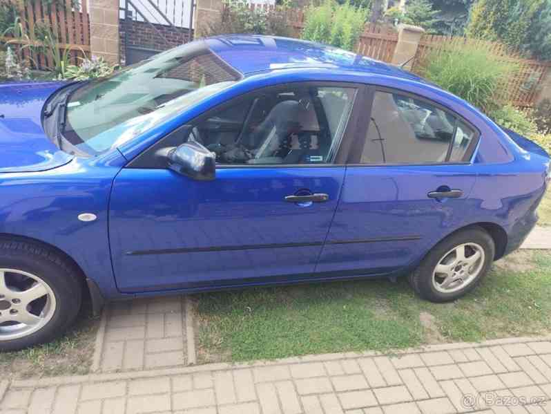 Mazda 3 1,6   77Kw r..v. 2008 najeto 141k - foto 10