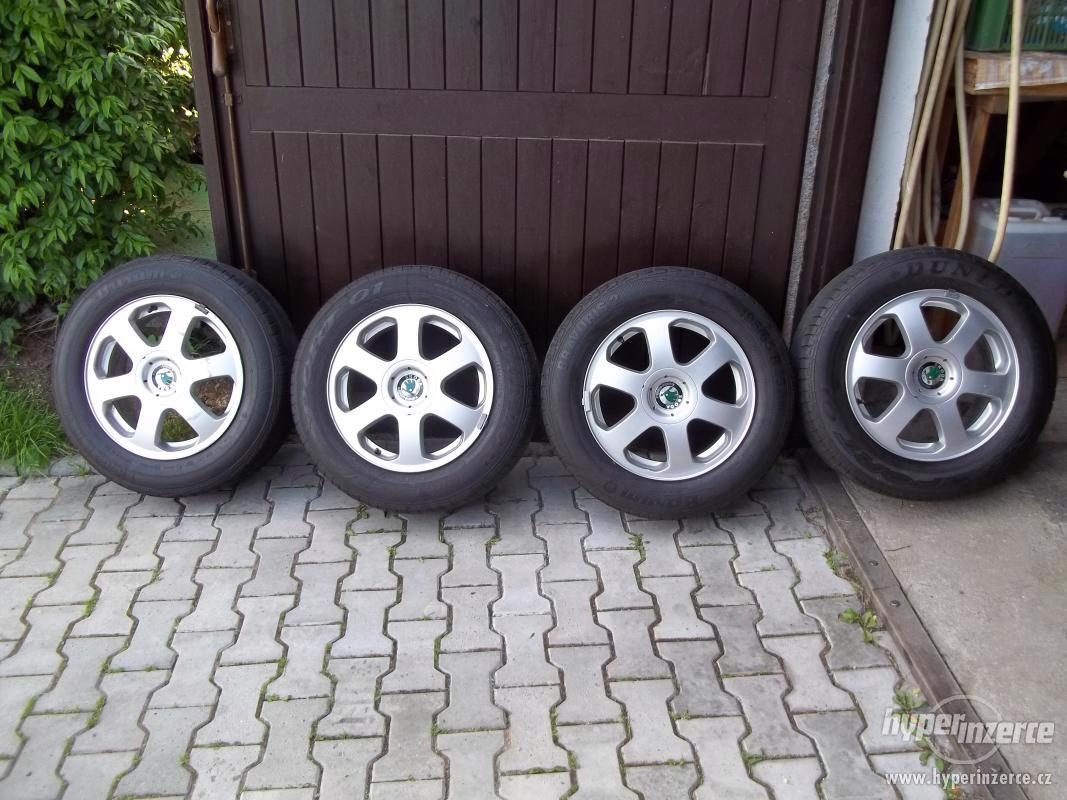 5x100  Originál alu kola škoda octavia s pneu 5mm - foto 1