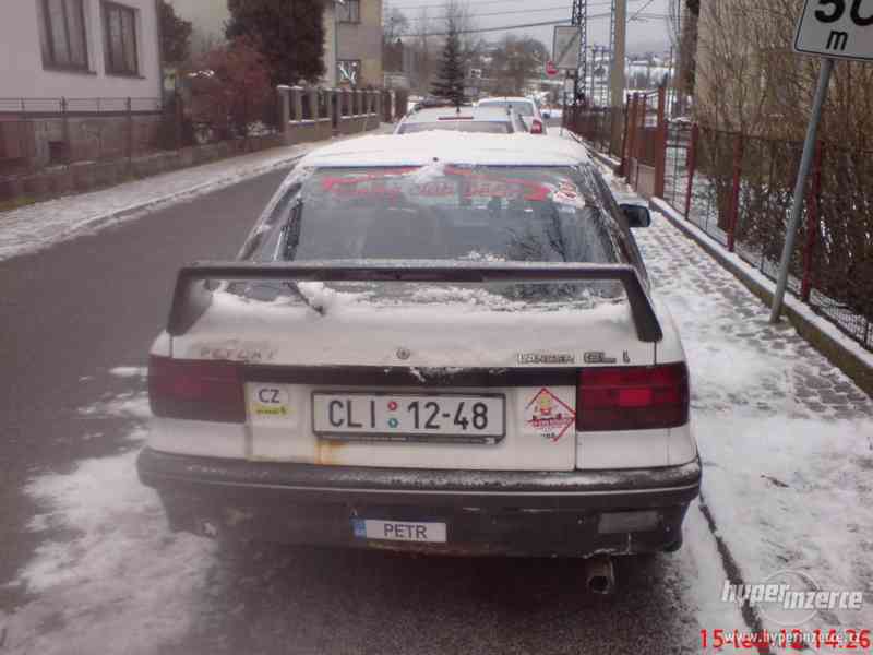 Mitsubishi Lancer - foto 4
