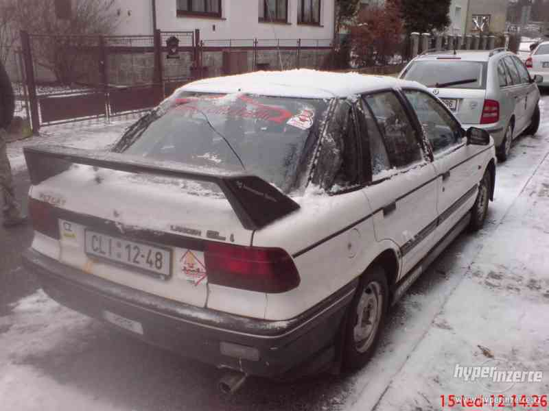Mitsubishi Lancer - foto 5