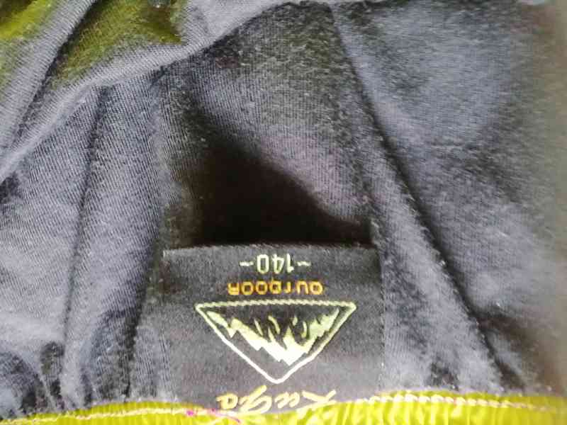 Šusťákové sportovní kalhoty zn. Kugo vel. 140 - foto 2