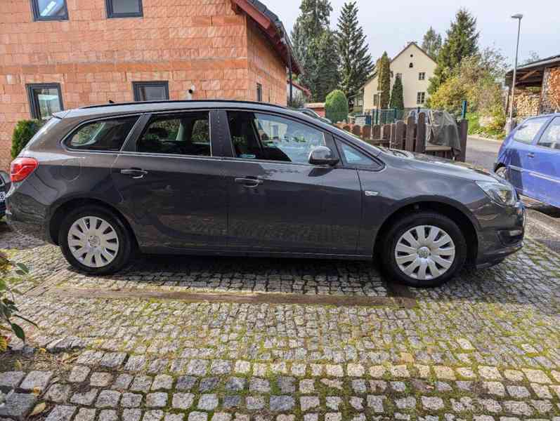 Opel Astra 1,7   Opel Astra J ST - foto 7