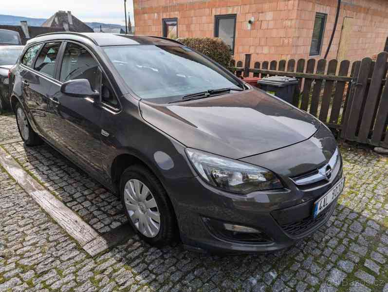 Opel Astra 1,7   Opel Astra J ST - foto 12