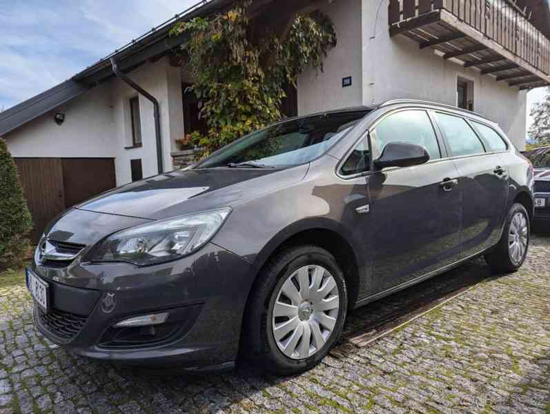 Opel Astra 1,7   Opel Astra J ST - foto 13