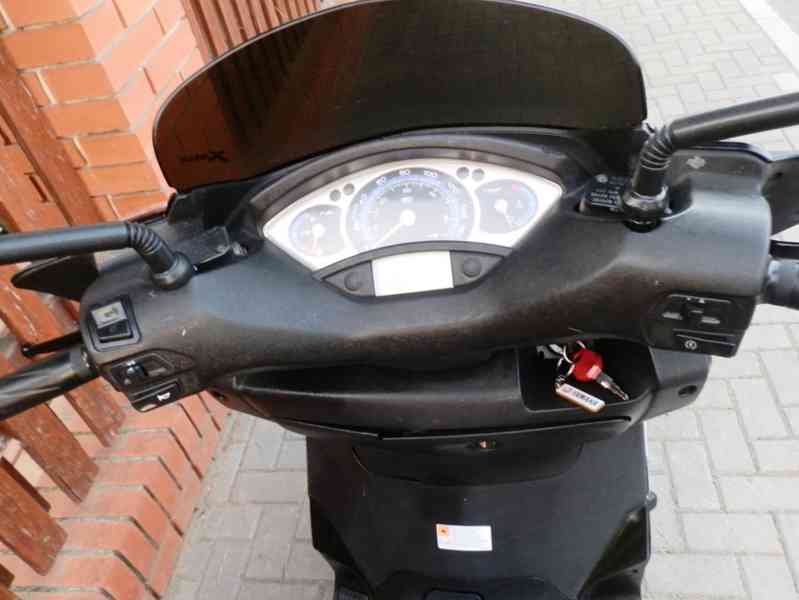 Yamaha X-Max 125 - foto 13