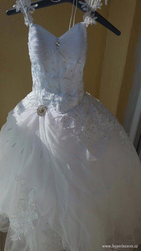 Svatební šaty - foto 11