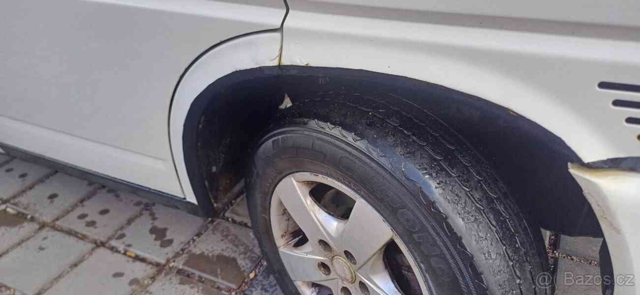 Volkswagen Caravelle 2,5   T4 tdi 75kw long - foto 12