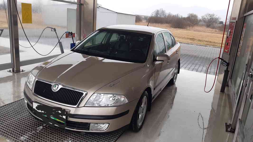 Octavia 2, 2.0 TDI 103Kw - foto 9