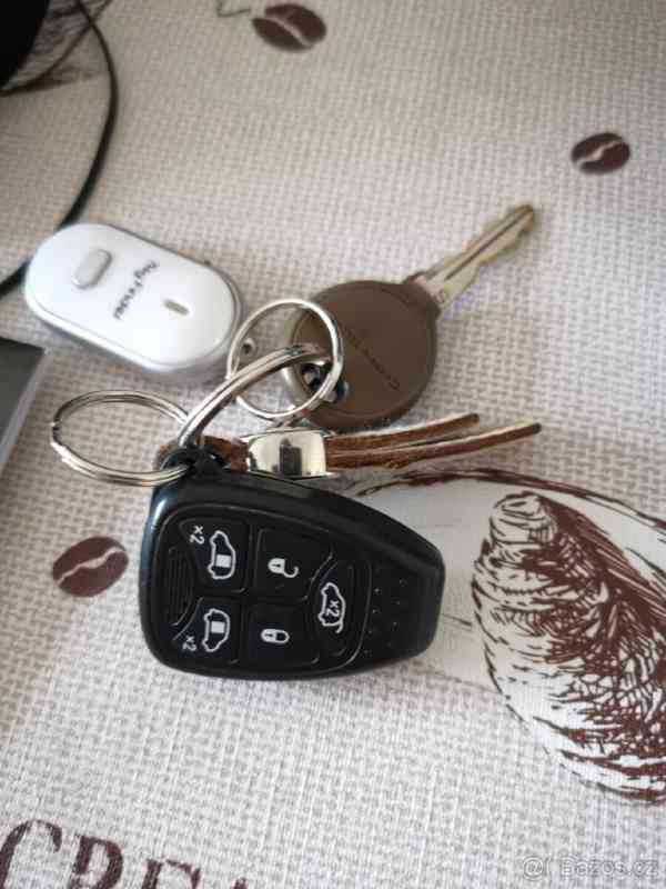 Chrysler Grand Voyager 2,8   limited stown n Go - foto 18