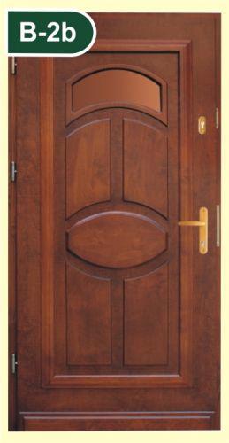 Vchodové dřevěné dveře včetně zárubní zateplené - foto 1