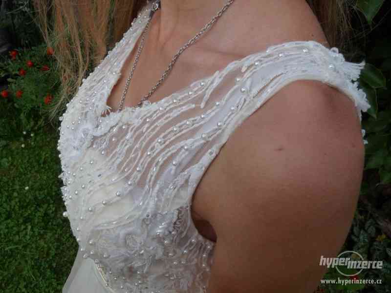 Svatební šaty - foto 9