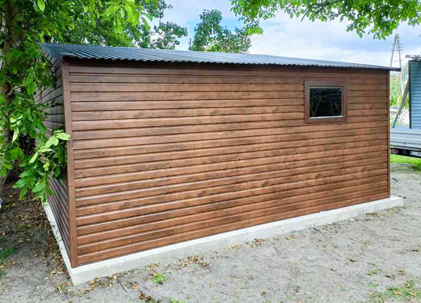 Plechová garáž 6x5,5m sedlová střecha 2x vrata + okno TS320 - foto 2