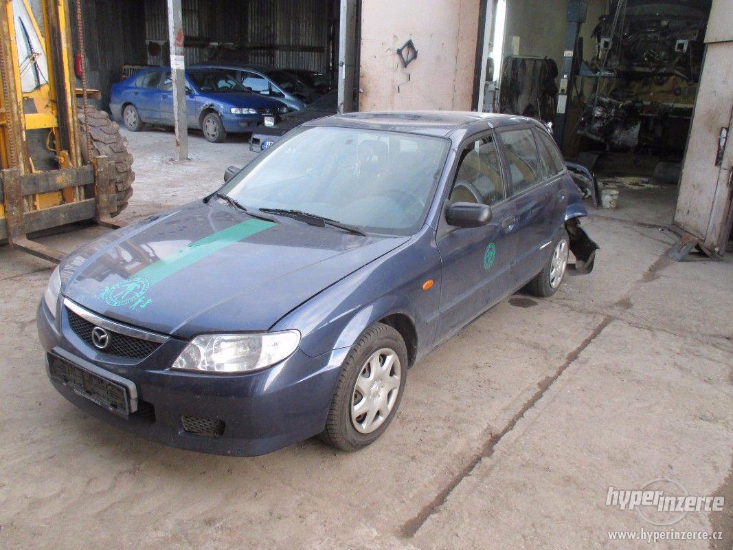 Prodám náhradní díly z Mazda 323  BJ r.v 2002 - foto 1