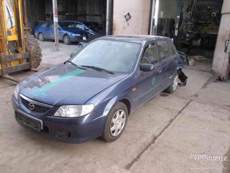 Prodám náhradní díly z Mazda 323 BJ r.v 2002 - foto 1