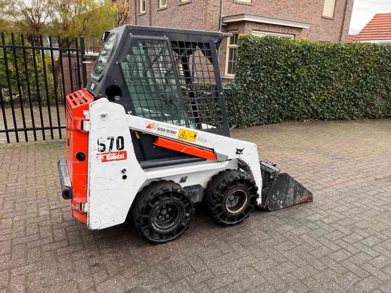 BOBCAT S70 - foto 12