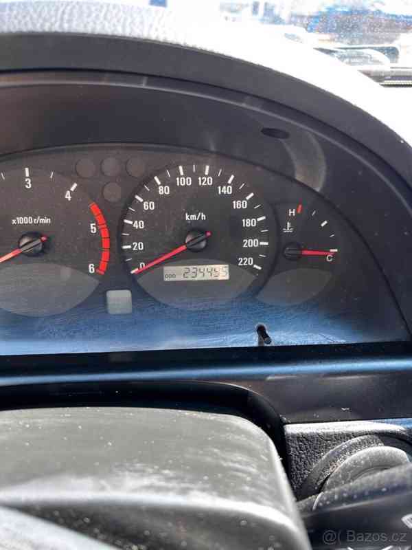 SsangYong Rexton 2,7   tdi Automat - foto 11