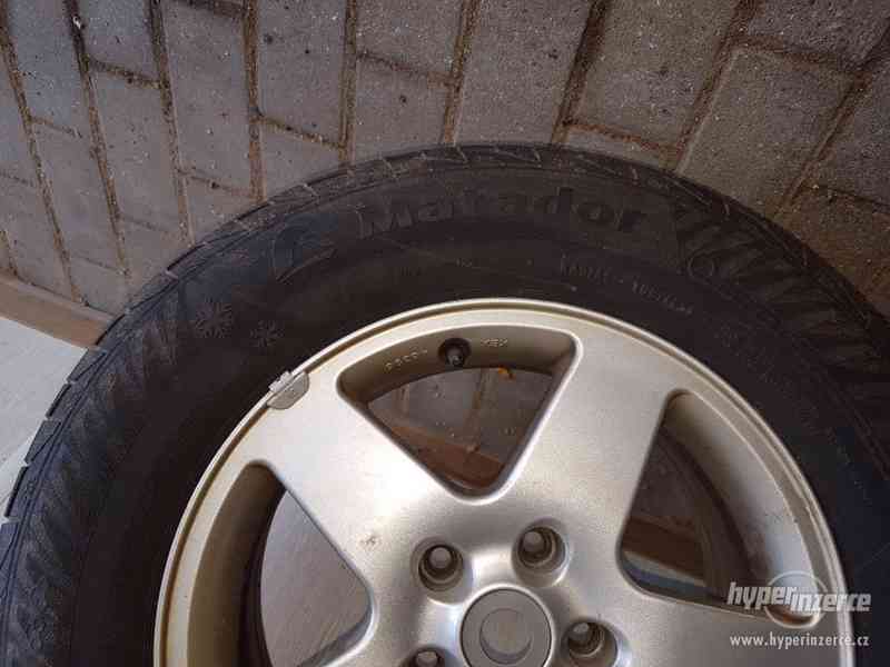 Zimní pneu s alu. disky - foto 3