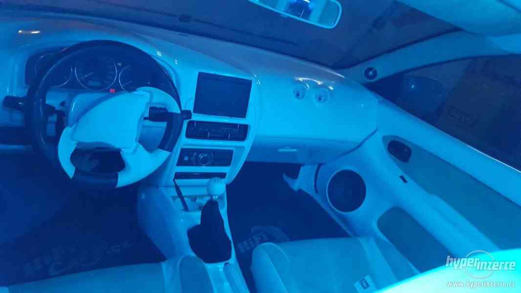 Mazda 323f - foto 7