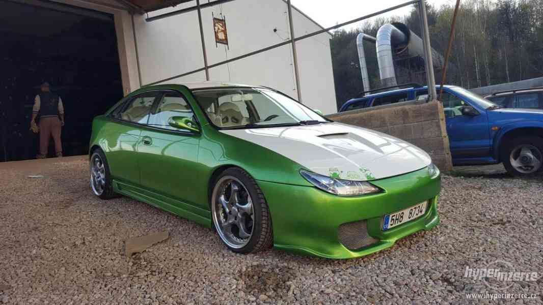 Mazda 323f - foto 11