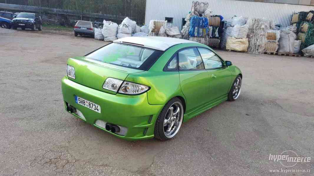 Mazda 323f - foto 12