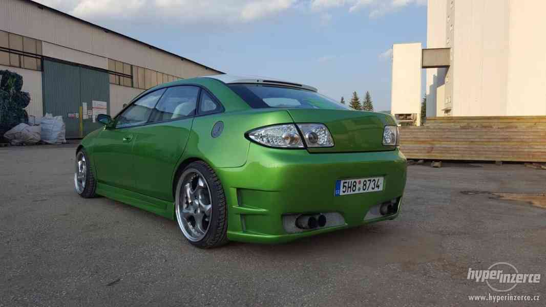 Mazda 323f - foto 13