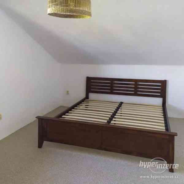 Dřevěná postel 180x200