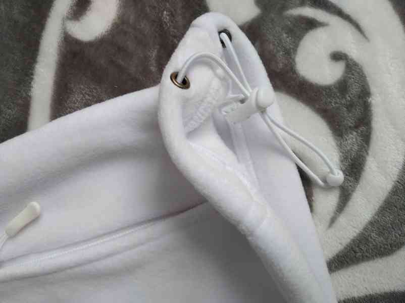 Nová bílá vesta s kapsami - fleece, vel. M - foto 2