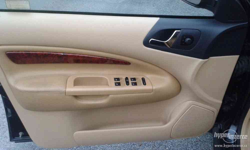 Škoda Oktavia 1.8.T Laurin a Klement 110KW r.1999.Černa met. - foto 5