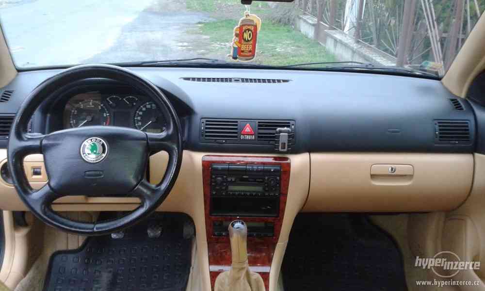 Škoda Oktavia 1.8.T Laurin a Klement 110KW r.1999.Černa met. - foto 6