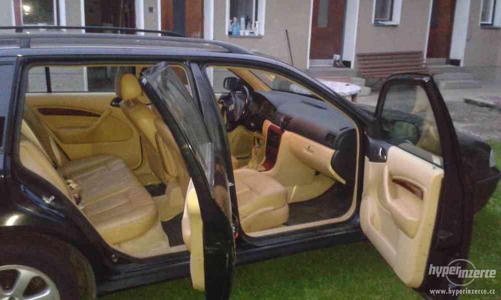 Škoda Oktavia 1.8.T Laurin a Klement 110KW r.1999.Černa met. - foto 9