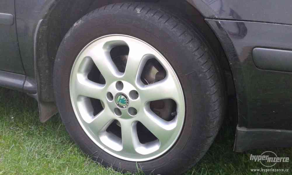 Škoda Oktavia 1.8.T Laurin a Klement 110KW r.1999.Černa met. - foto 10