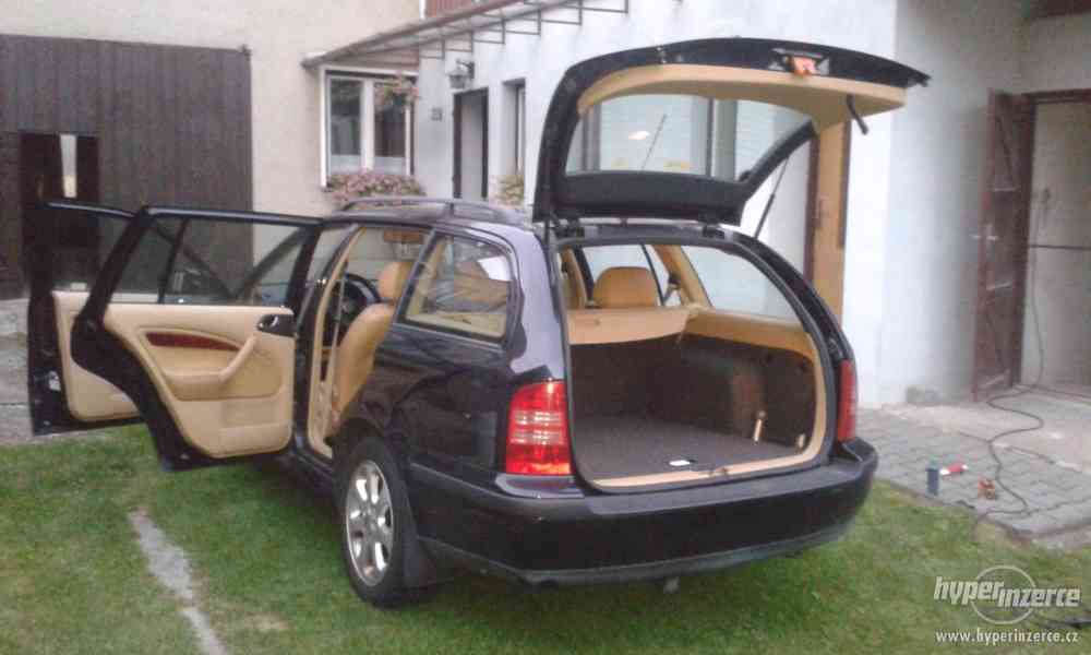 Škoda Oktavia 1.8.T Laurin a Klement 110KW r.1999.Černa met. - foto 11