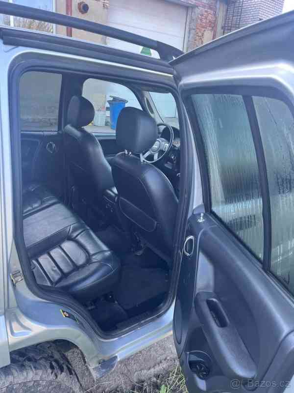 Jeep Cherokee 2,5   KJ - foto 11