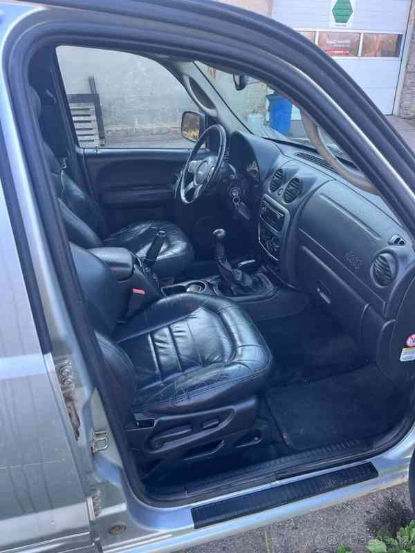 Jeep Cherokee 2,5   KJ - foto 13