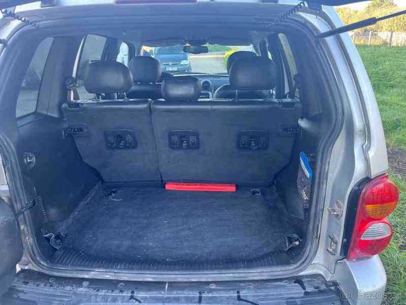 Jeep Cherokee 2,5   KJ - foto 5
