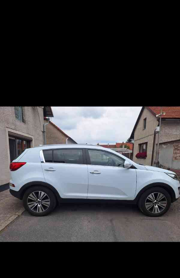 Kia Sportage  2.0 benzin  - foto 4