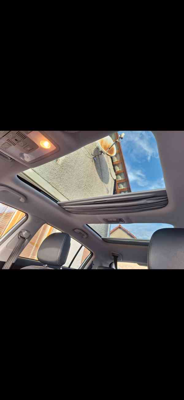 Kia Sportage  2.0 benzin  - foto 9