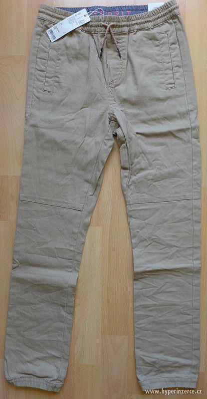 Nové strečové kalhoty Esprit pružný pas, 158 (12-13 let) - foto 1