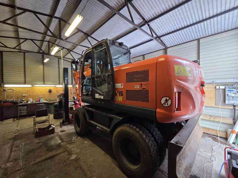 Hitachi ZX 140W-3 - foto 12