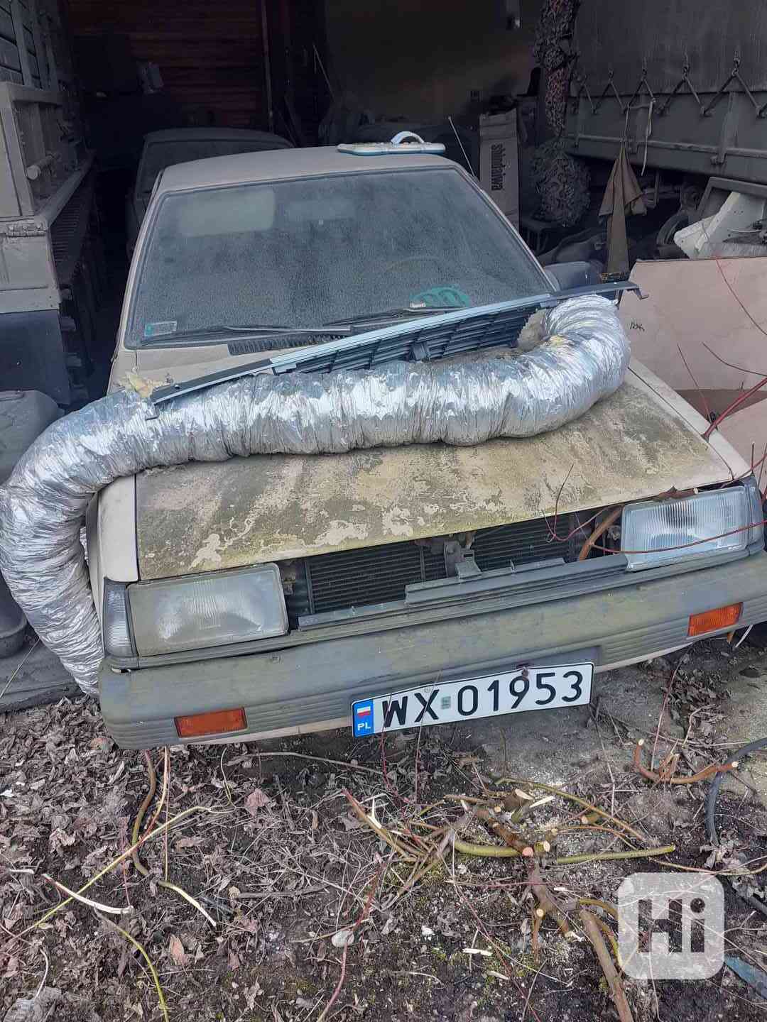 Nissan Datsun 1983 - foto 1